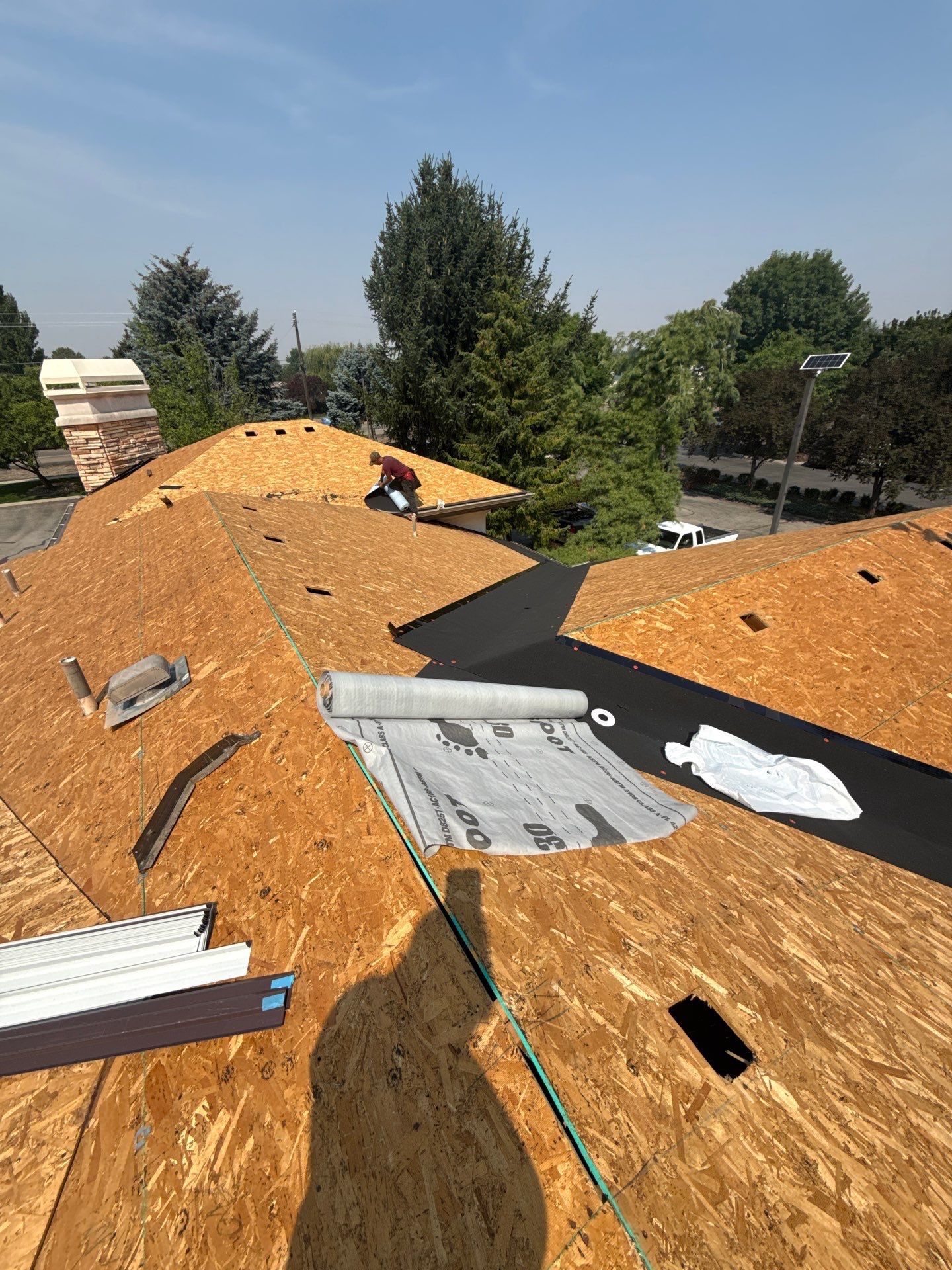 Boise Commercial Roof Replacement with Brown Architectural Shingles by Olive Roofing