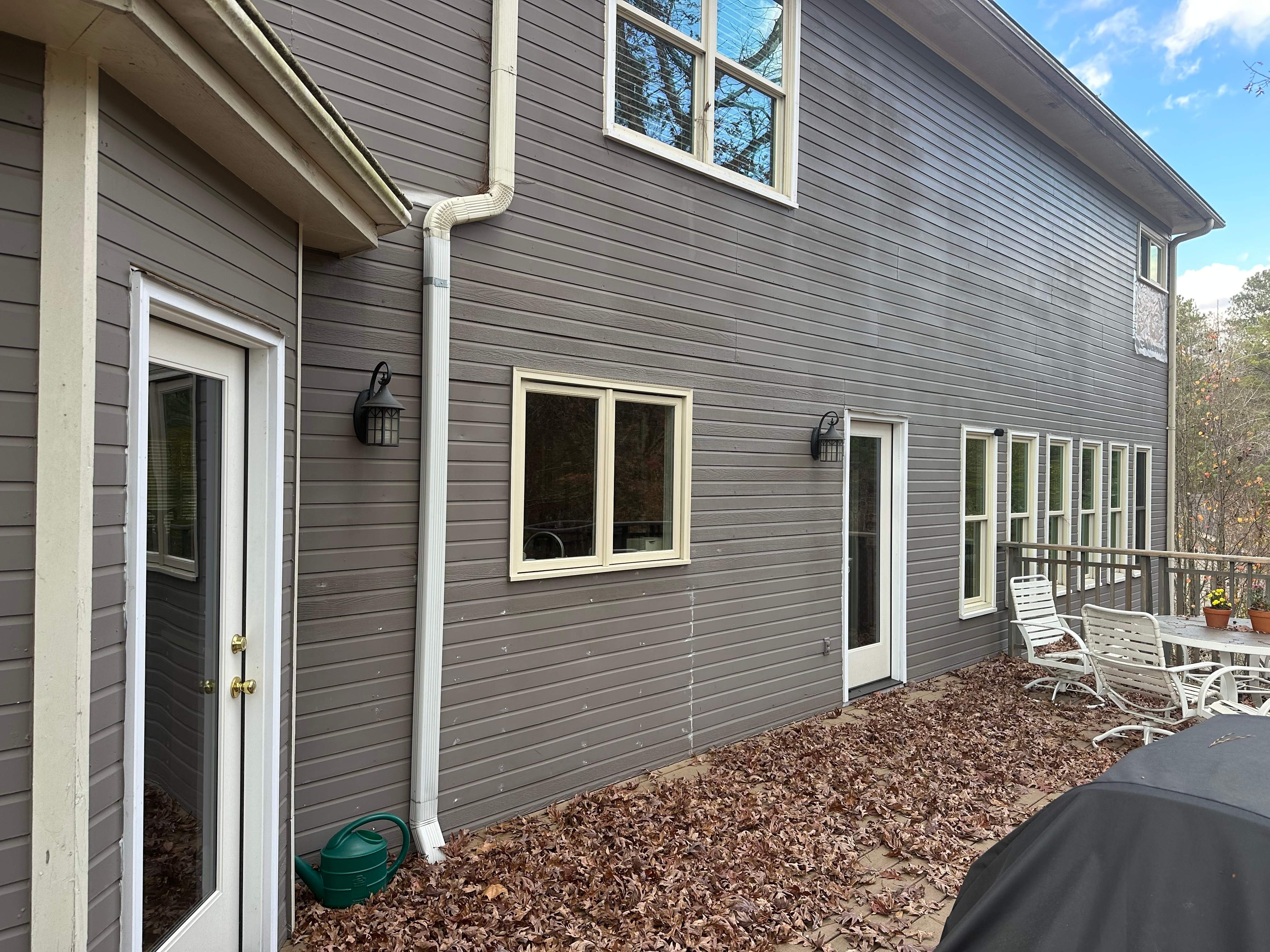 James Hardie Siding Replacement, Exterior Painting, Deck Stain, and Gutter Installation in Peachtree Corners, GA by Nelson Exteriors 