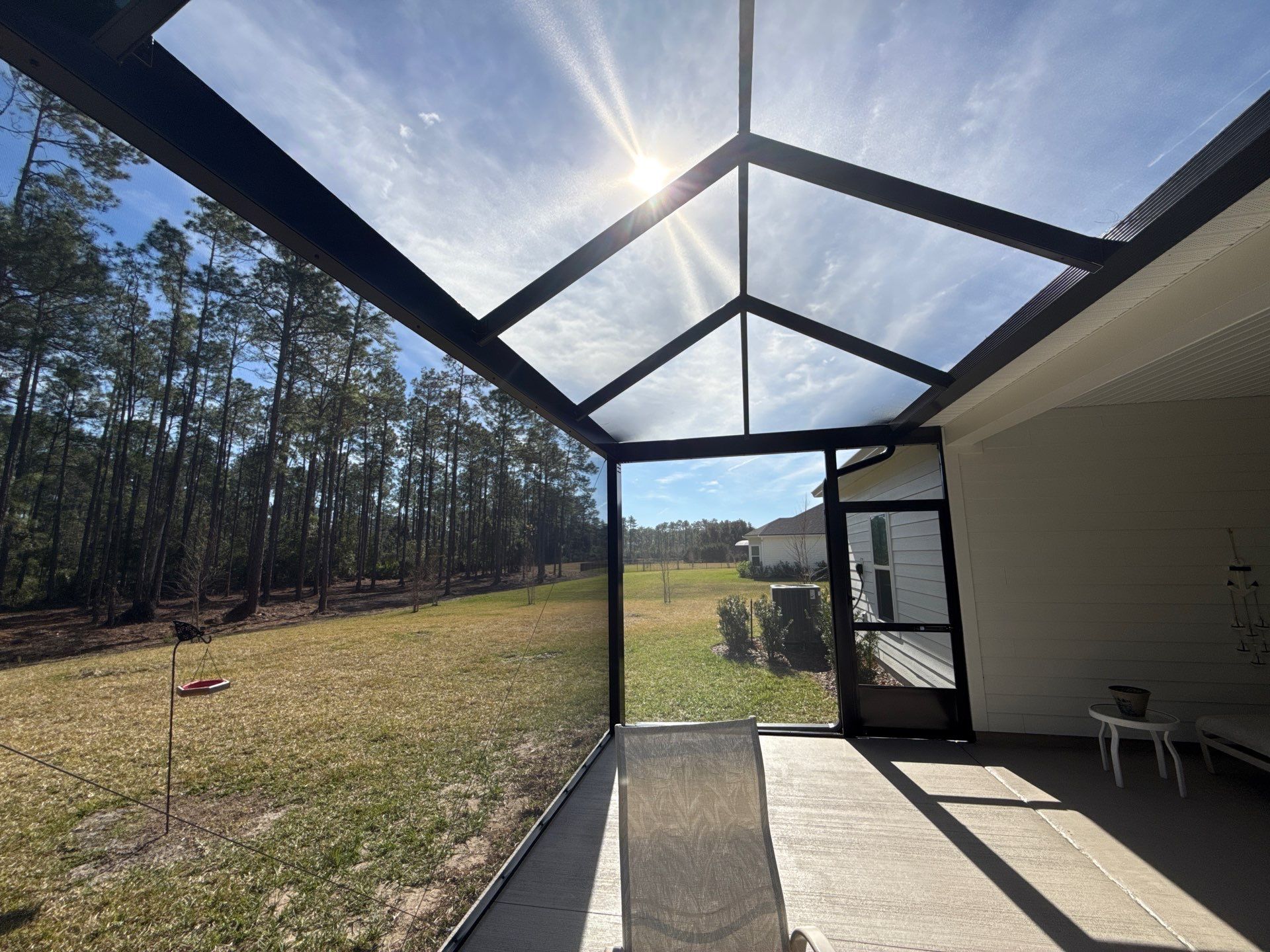 Gable screen enclosure w/ultraview + concrete by Courtesy screening