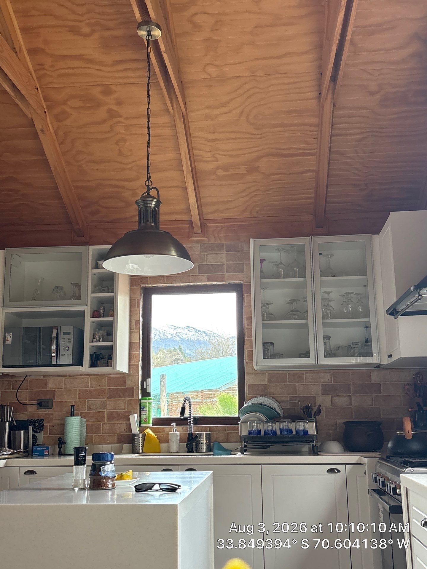 Modern Kitchen Remodel Featuring Vaulted Ceilings and White Shaker Cabinetry by CompanyCam Sales Demo