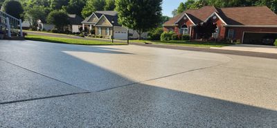 Incredible transformation on Driveway Garage and Sidewalk!