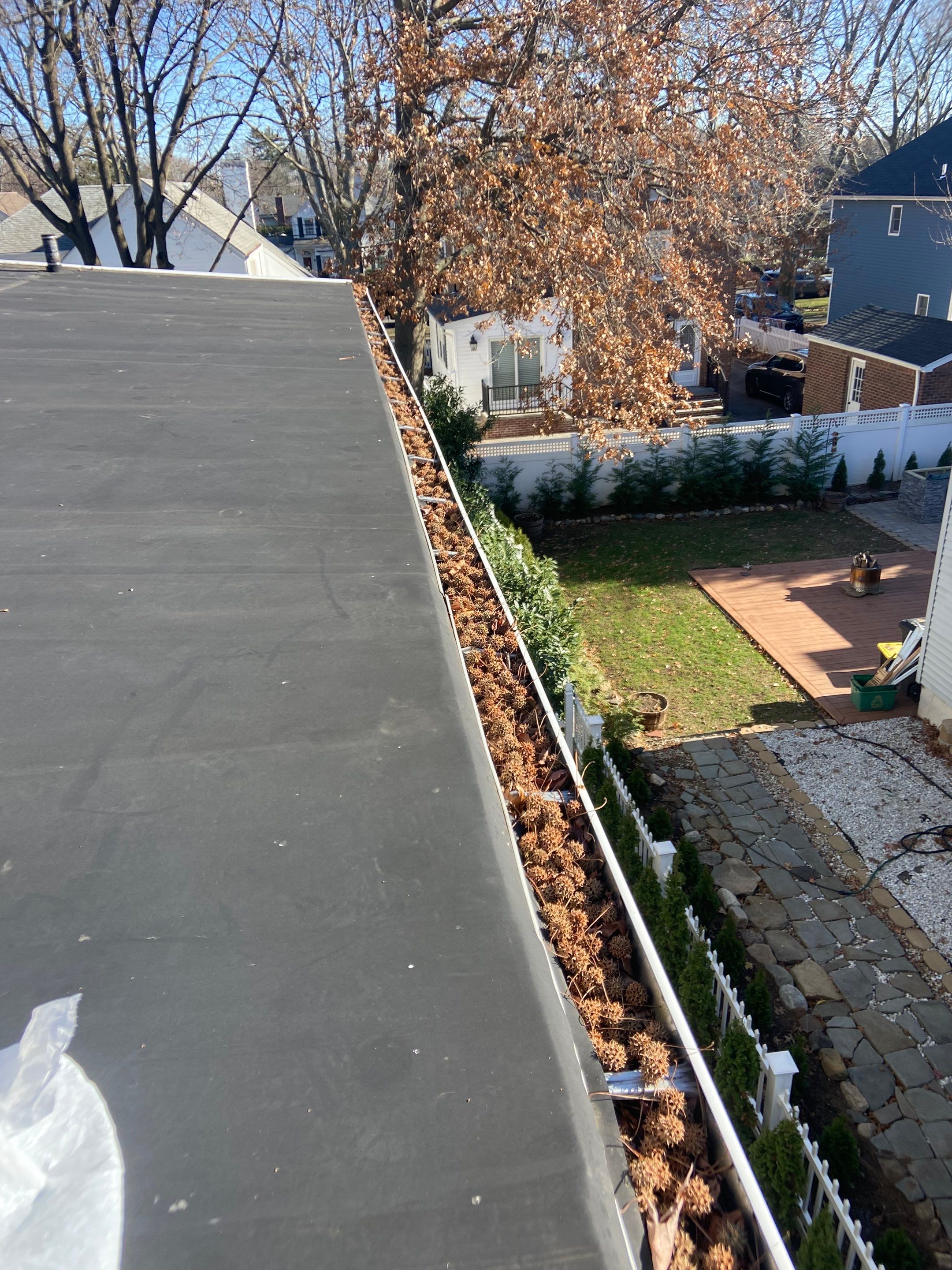 Gutters Clogged with Itchy balls by Above All Gutters