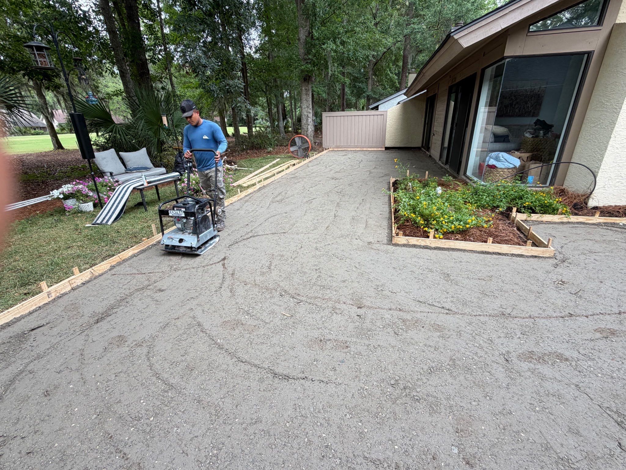 Custom Concrete Patio and Herringbone Paver Walkway in Hilton Head Island by Lowcountry Scapes, LLC