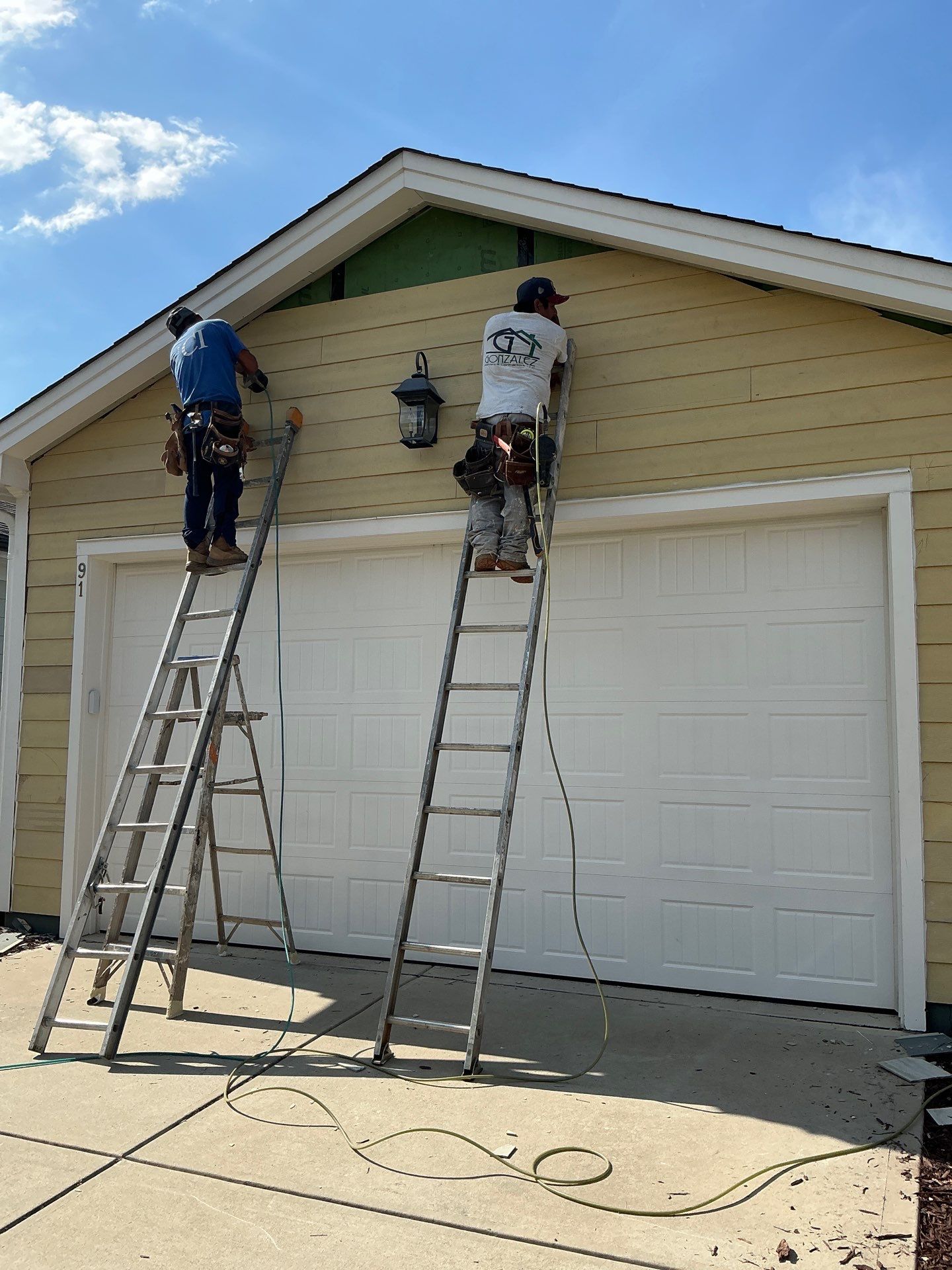 Siding replacement and exterior painting by GonzalezPainters & Contractors Inc