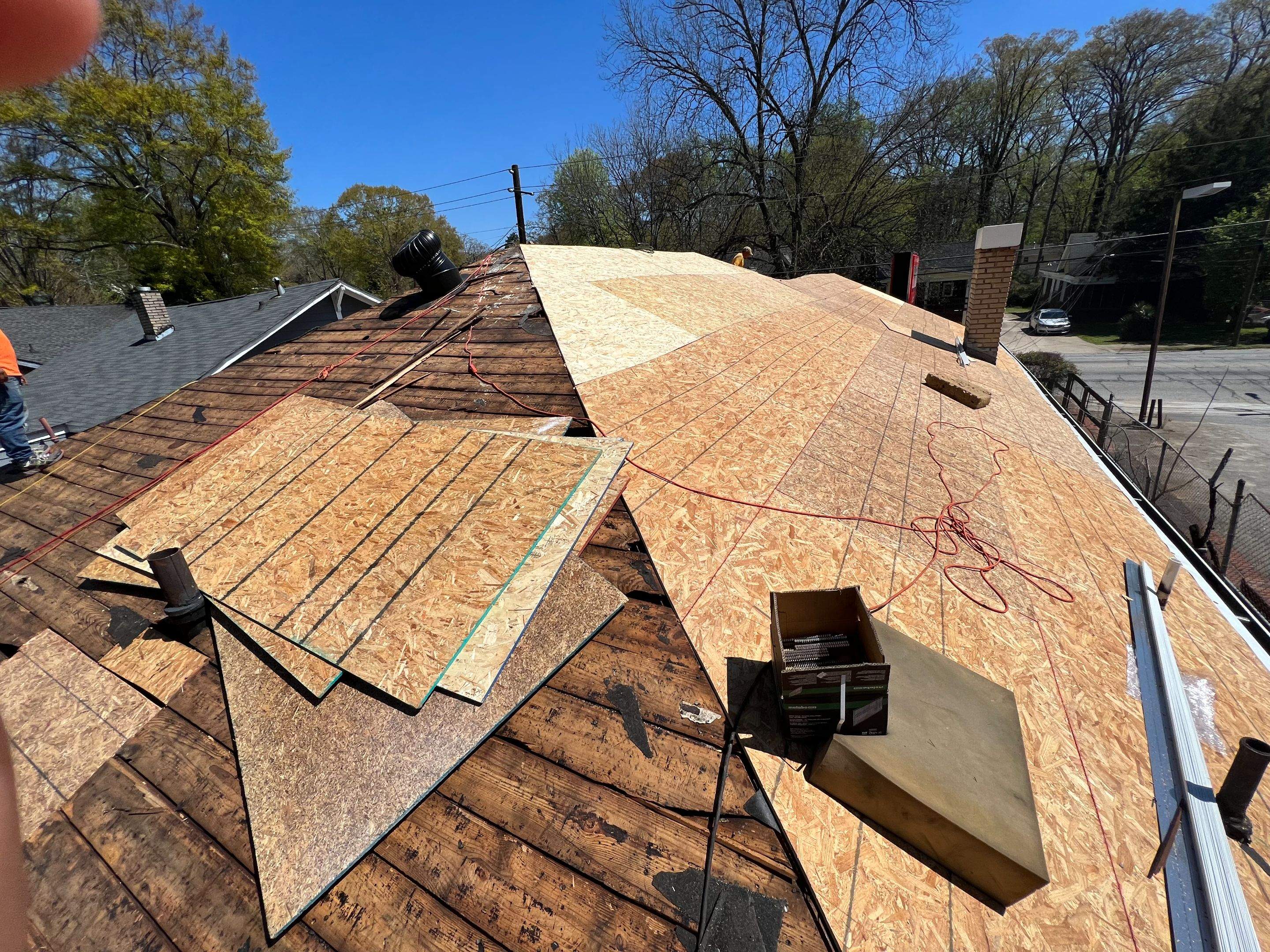memorial tattoo roof & gutter replacement by Nailed It Roofing & Remodeling LLC