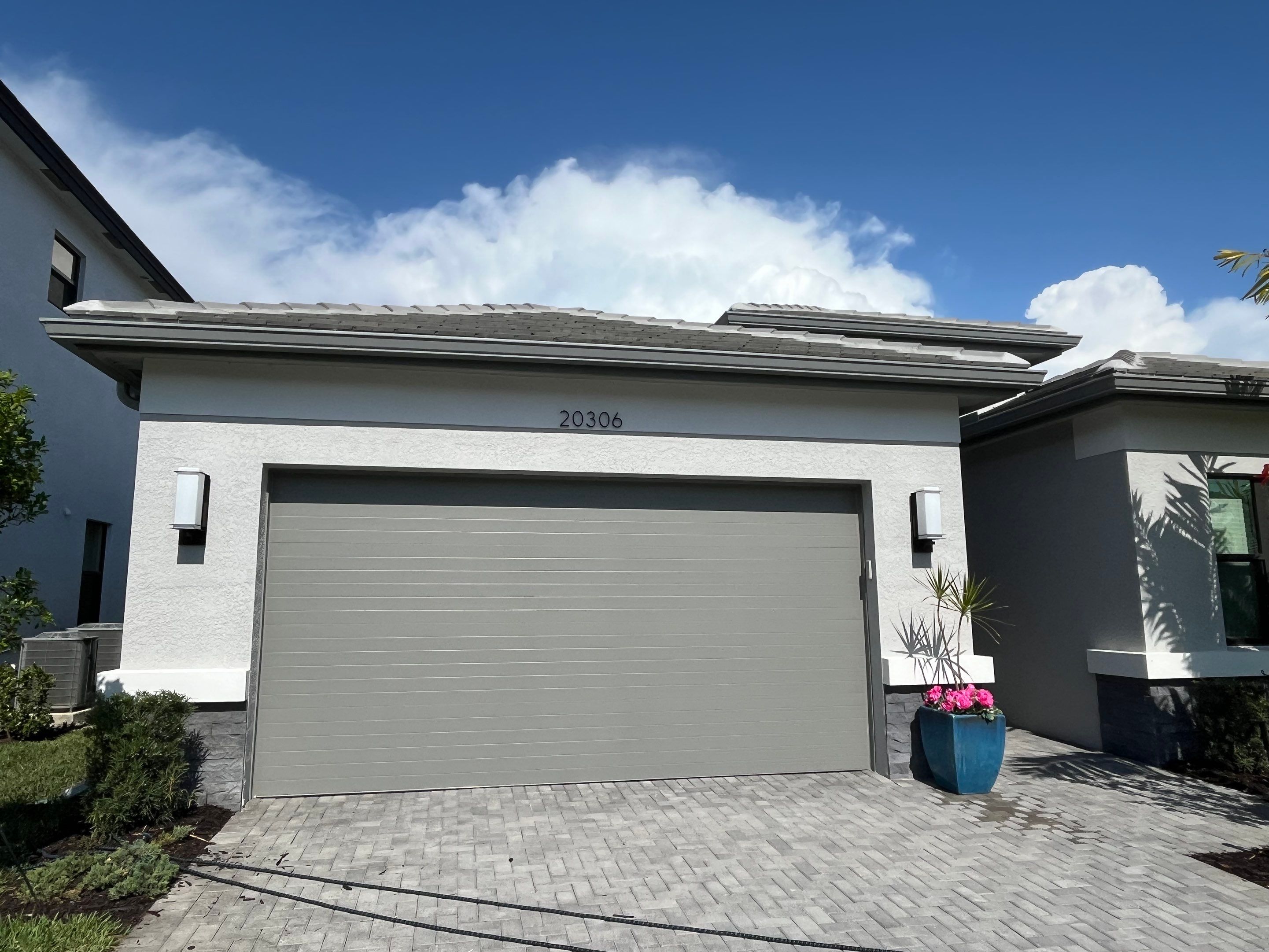 Grey Seamless Gutter Installation in Estero FL by Gutter Professors