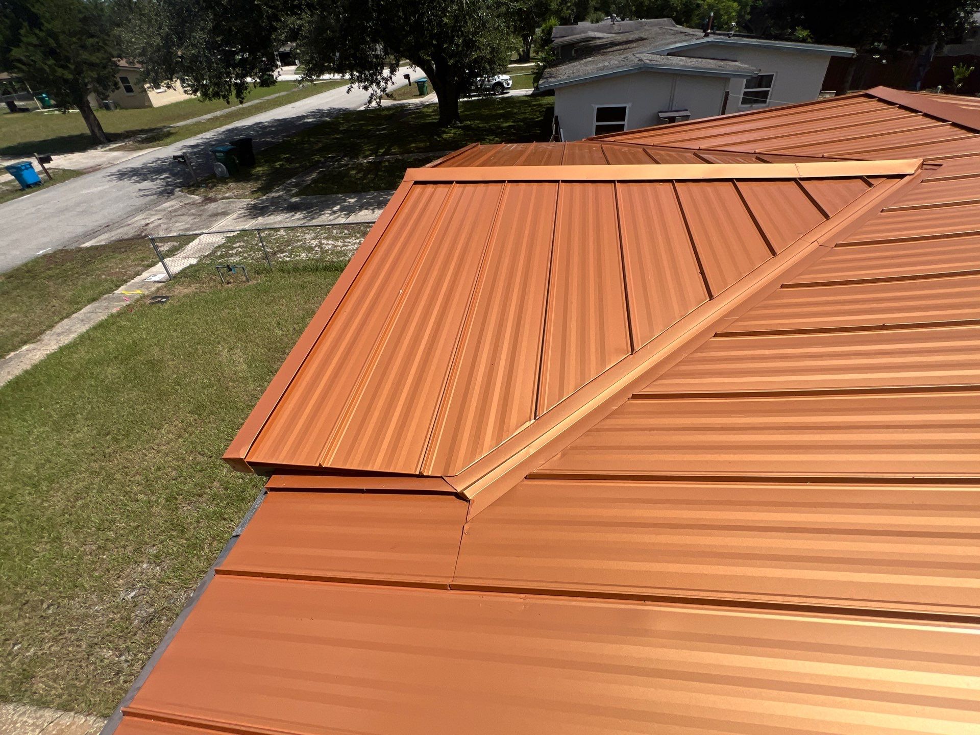 Standing Seam Metallic Copper Metal Roof Replacement in Deltona by Pinnacle Roofing Group