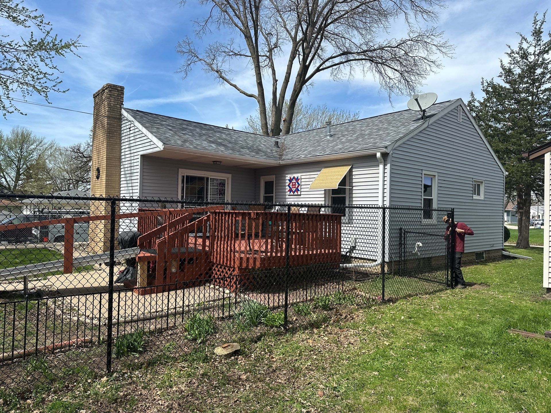 Black Chain Link Fence Installation for Waterloo Residential Backyard by Perfect Picket Fence and Stain