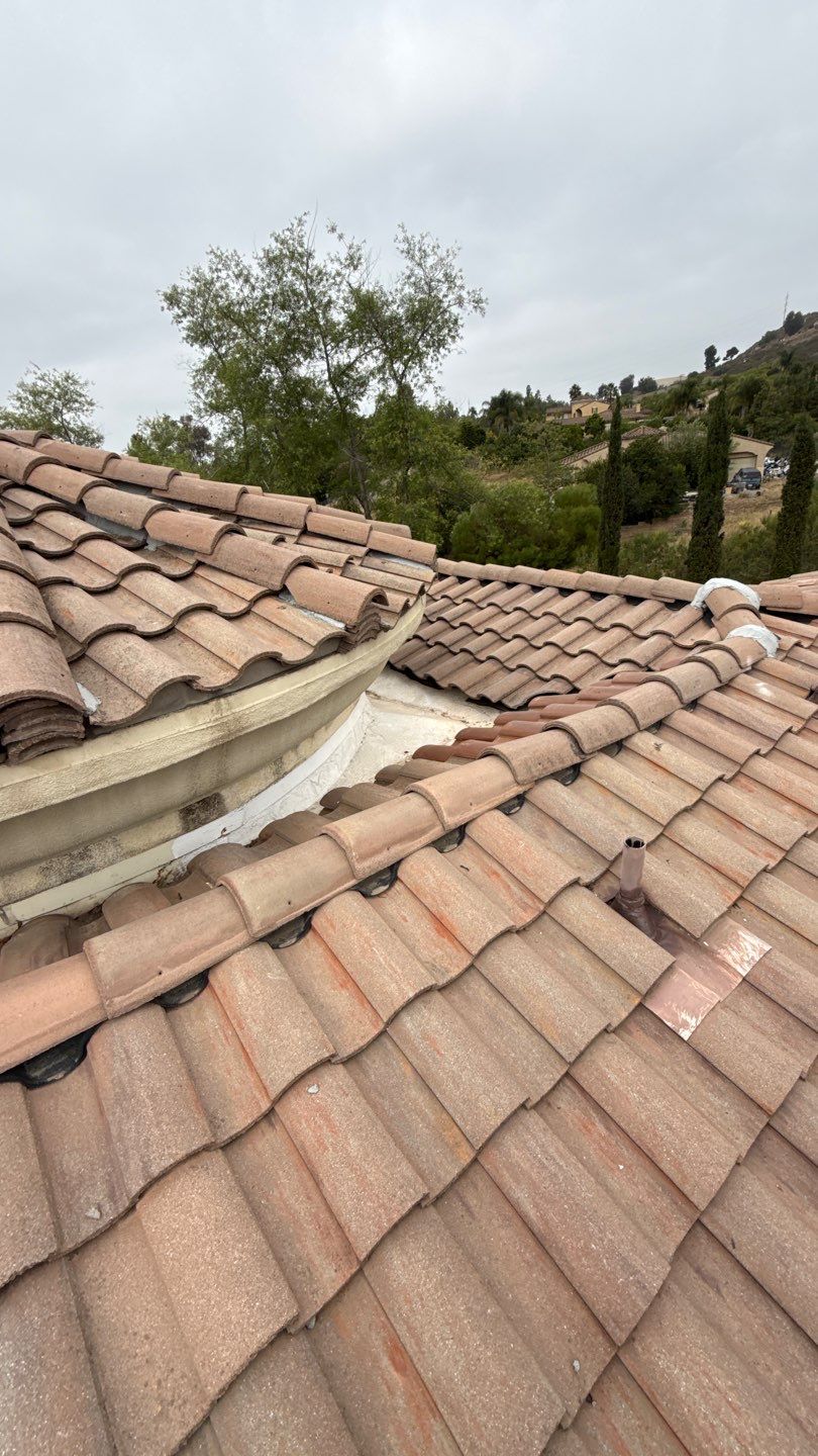 Terracotta Tile Roof Repair and Ridge Cap Sealing in Escondido by Reliable Roofing San Diego Inc.