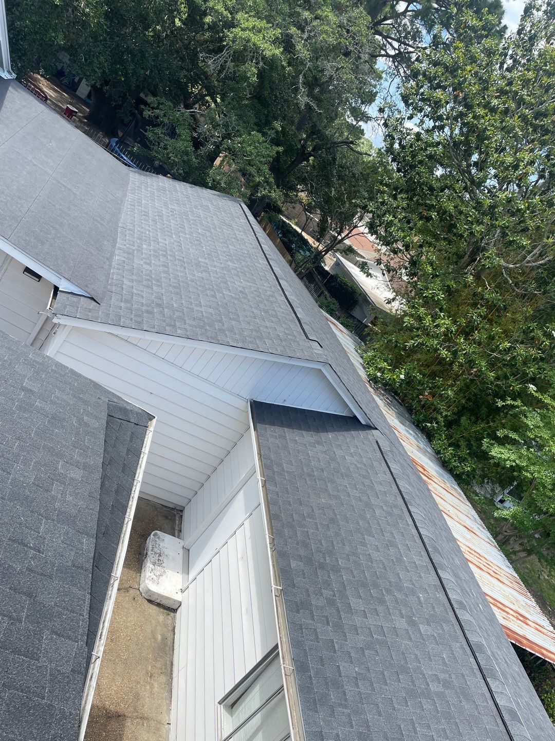 Residential Roofing Installation using Roof Replacement by American Roofing & Construction LLC