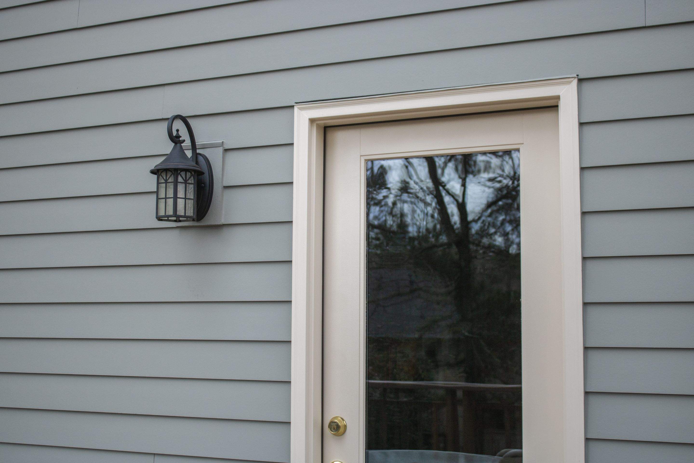 James Hardie Siding Replacement, Exterior Painting, Deck Stain, and Gutter Installation in Peachtree Corners, GA by Nelson Exteriors