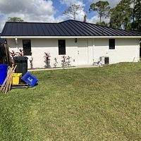24ga 1.5" Mechanical Seam Dark Bronze by Total Roofing System The Metal Roof Experts