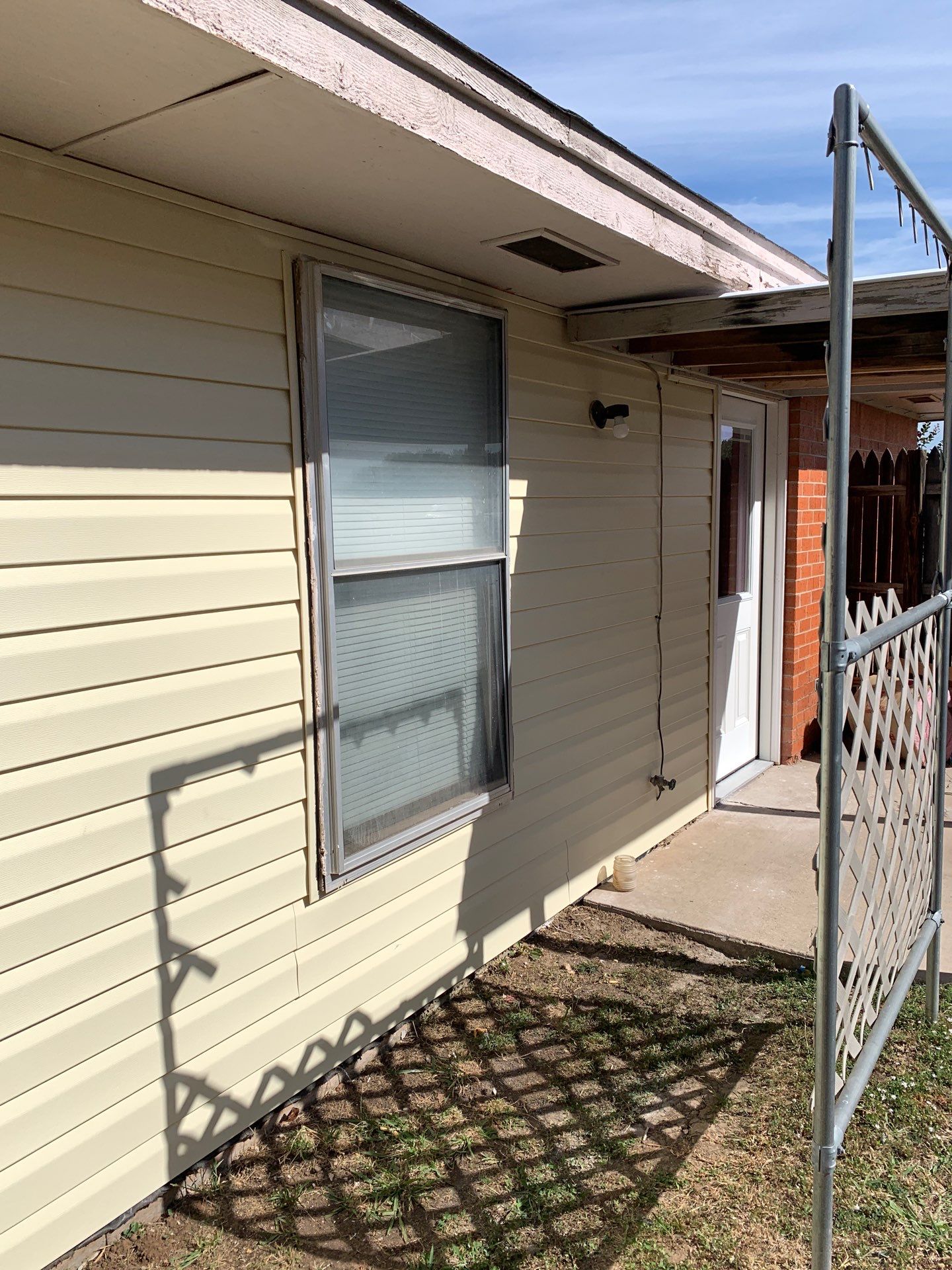 Siding Replacement and Door Replacement in Norman, OK by McCann's Roofing and Construction