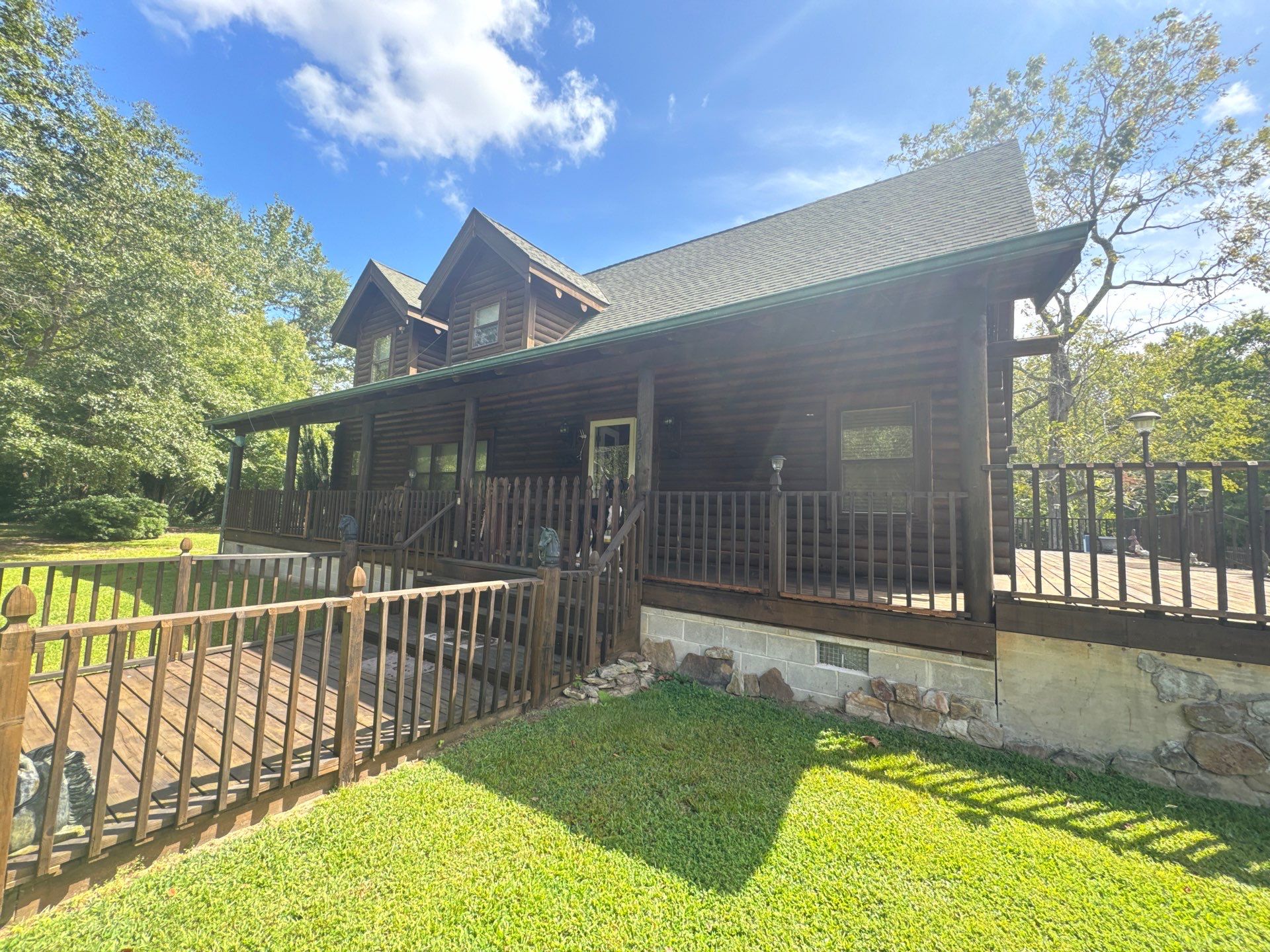 Smithfield Log Cabin by AKK Painting LLC