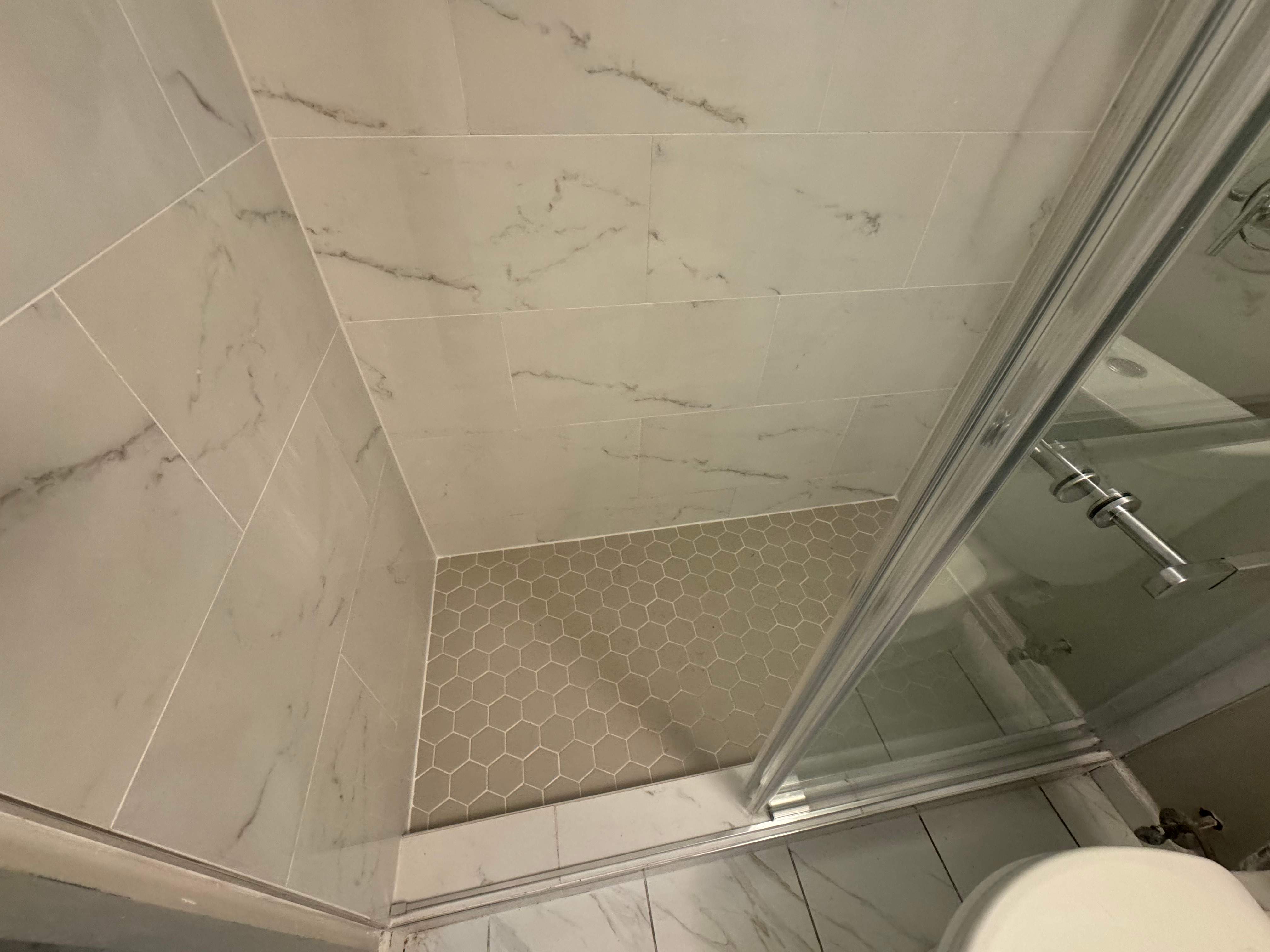 Tub to walk-in shower conversion by Prudencio