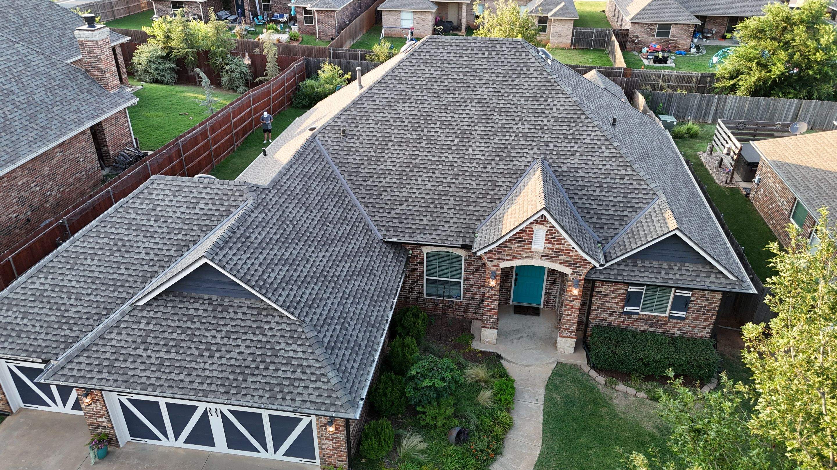 GAF Architectural Shingle Roof Replacement and Decking Repair in Mustang by 5Coat Roofing & Construction