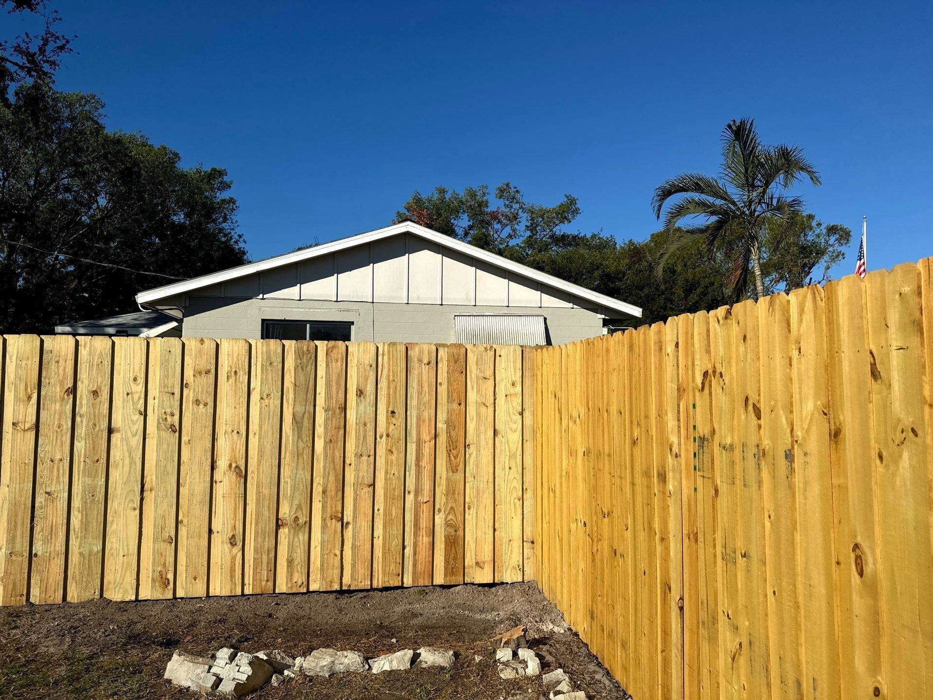 Wood Fence Installation using 6Ft Pressure Treated Wood Board On Board Privacy Fence by Asap fence and gates, LLC