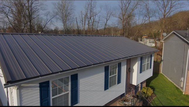 Residential Roofing Installation using Union Corrugatting Metal Roofing by Fahey Roofing + Contracting