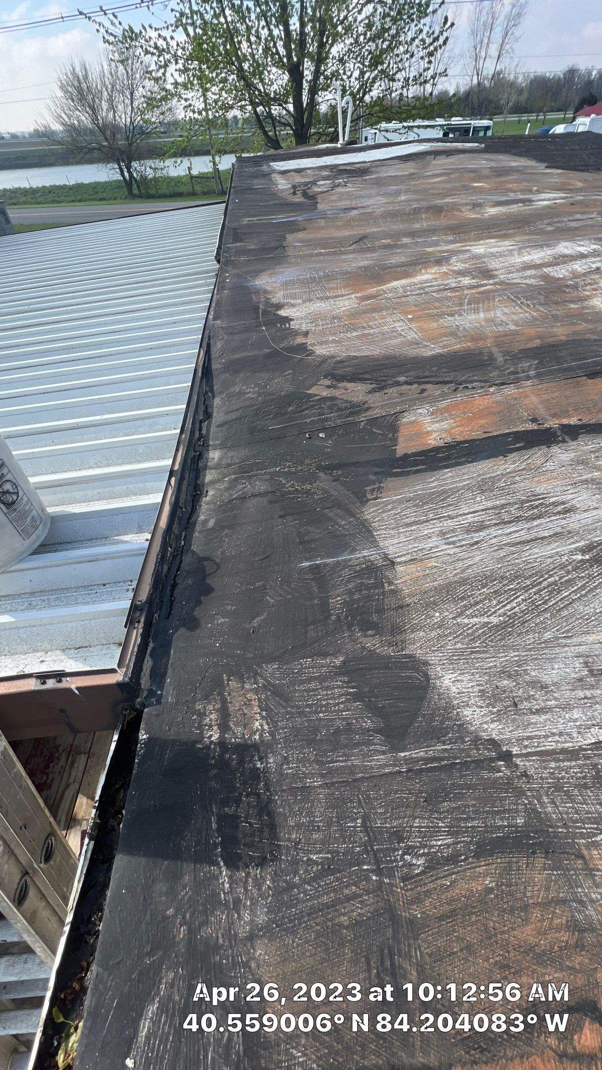 Residential Roofing Installation using 60 mil rubber roof  by Nitro Roofing and Construction