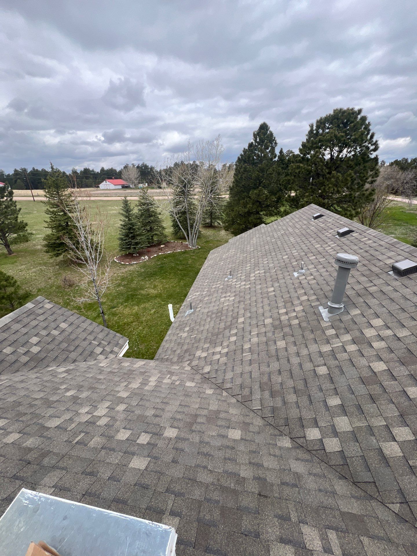 Residential Roofing Installation using Atlas Pinnacle Impact Weathered Wood by Blue Peaks Roofing LLC 