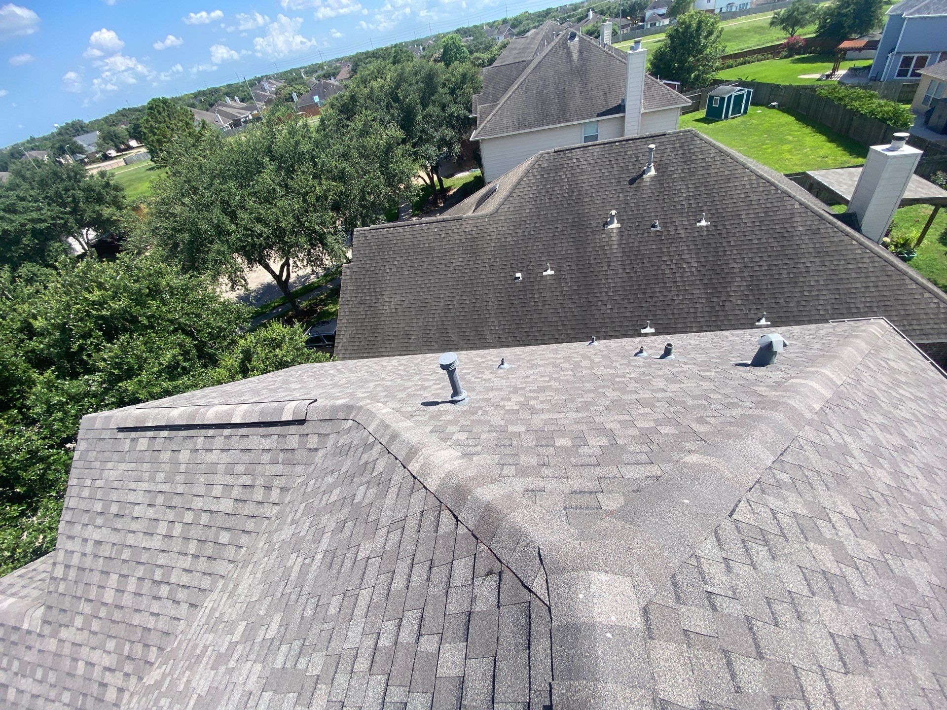 Hail Damage using Owen's Corning Duration (Lifetime) Shingles by Roof Repair Company