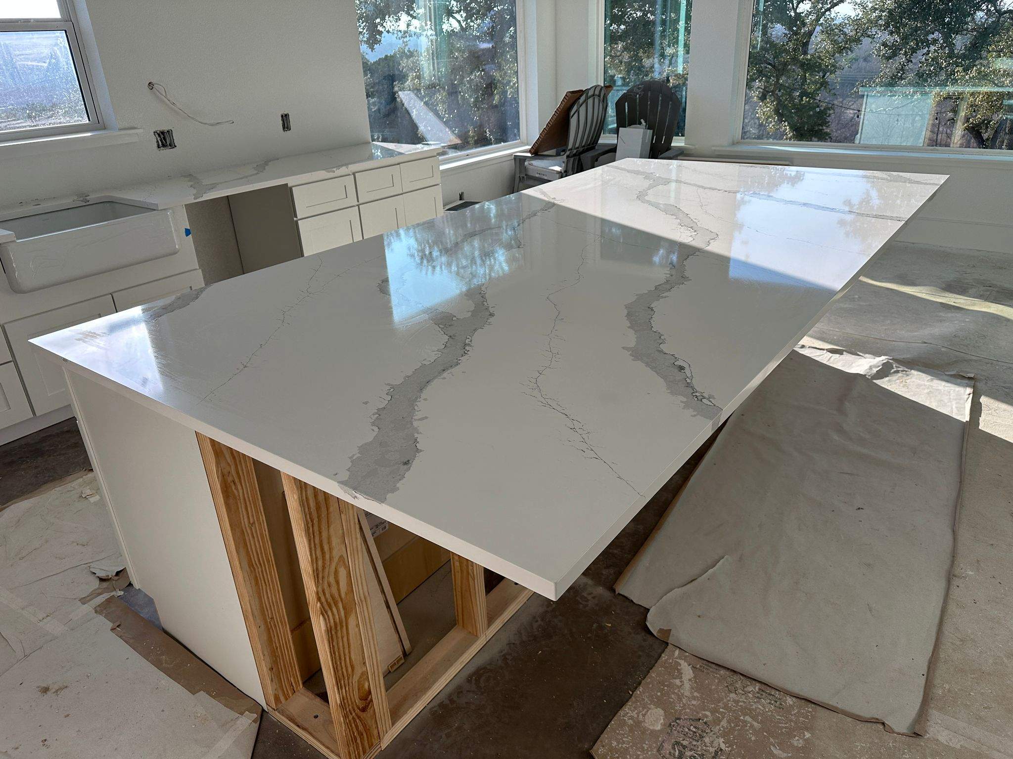Kitchen and Bathroom Countertop Upgrades Featuring Gray Veined Quartz by Mena stone surfaces