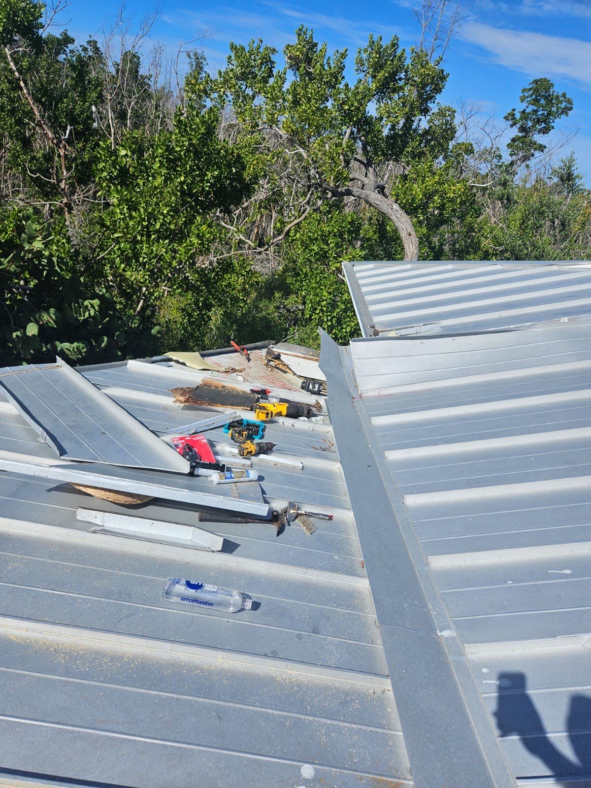 Residential Roofing Repair using Gulf Coast Metals Gulf Seam Panels by Four Peaks Roofing