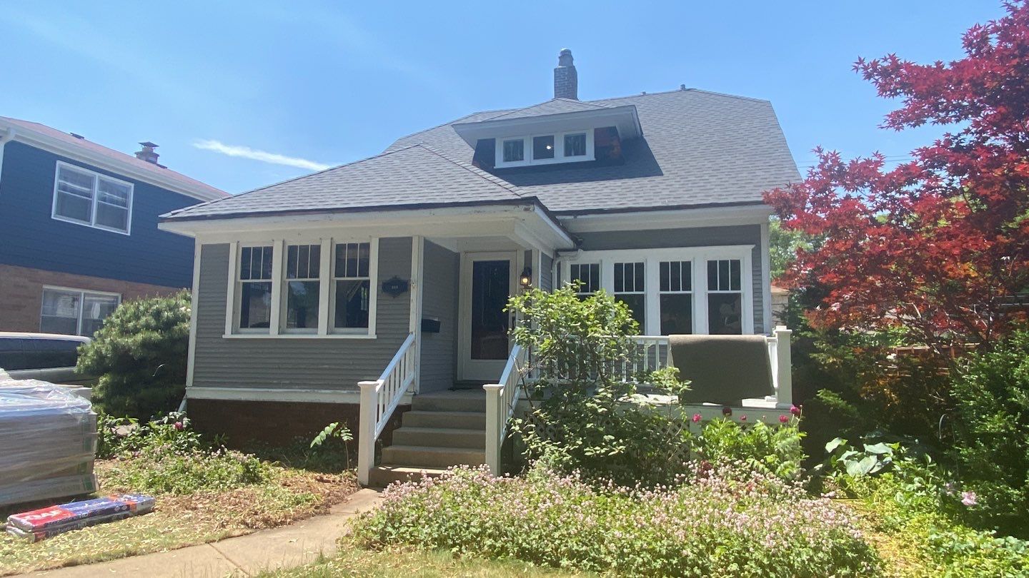 Asphalt Roof, Vinyl Siding, and Aluminum Gutter Replacement by Custom Installations