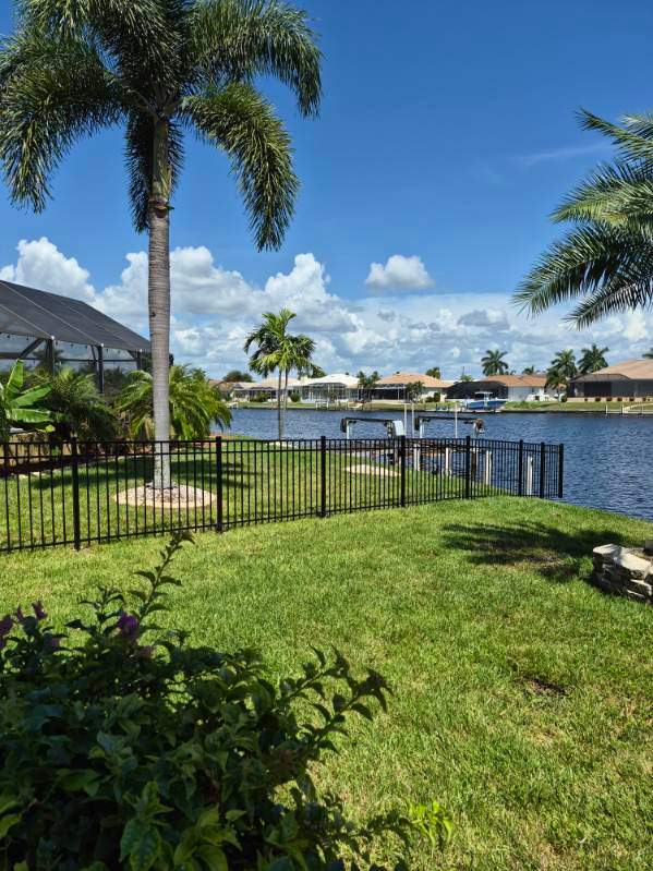 Custom Black Aluminum Fence Enclosure for Punta Gorda Waterfront Property by True Fence LLC