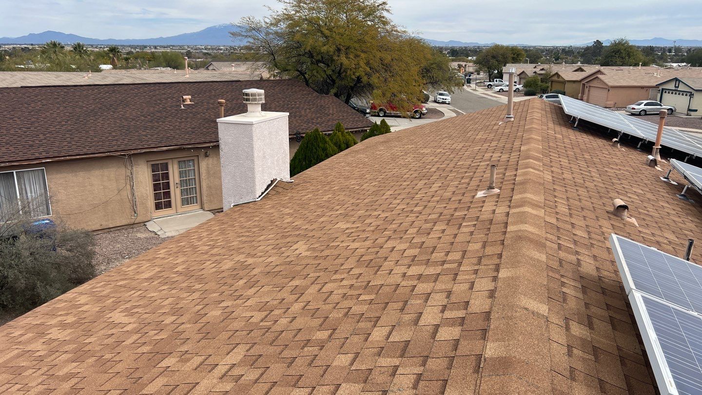 Charcoal Shingles by Reimagine Roofing