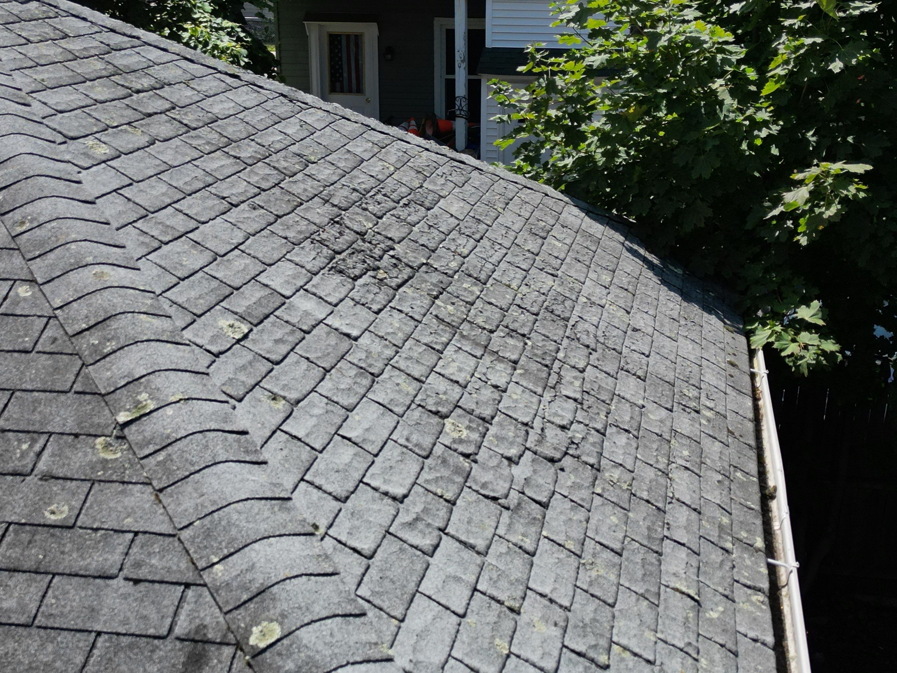 Roof Replacement with Skylight Flashing in Waltham, MA by Mighty Dog Roofing of Greater Middlesex County