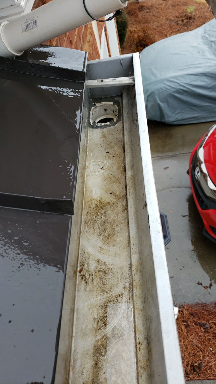 Gutter Cleaning using water by Power Wash Masters LLC