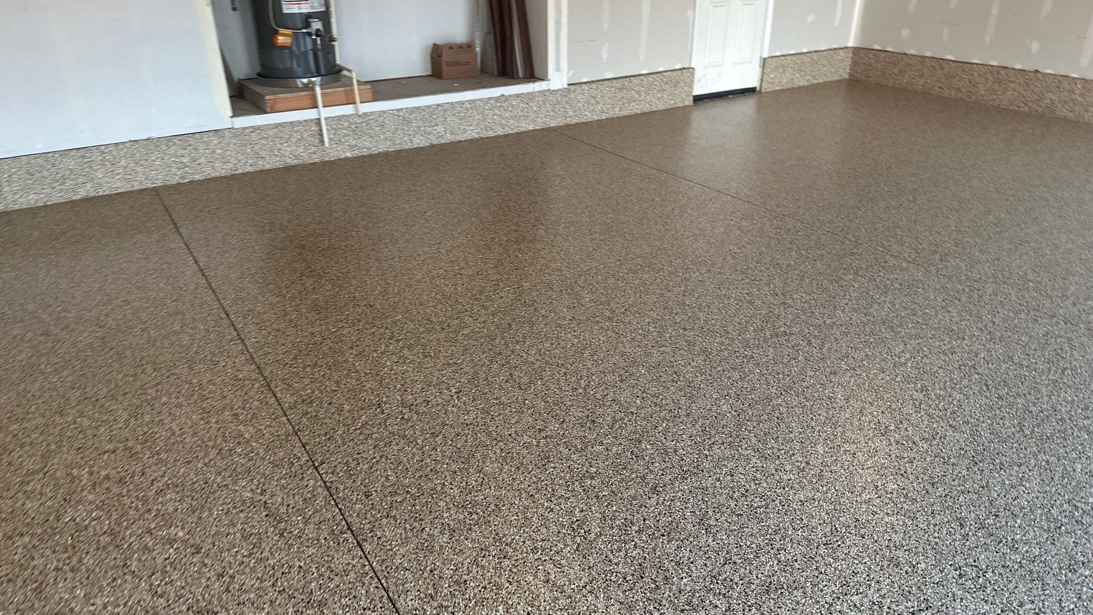 Garage Transformation using Sandstone by Croc Coatings, LLC