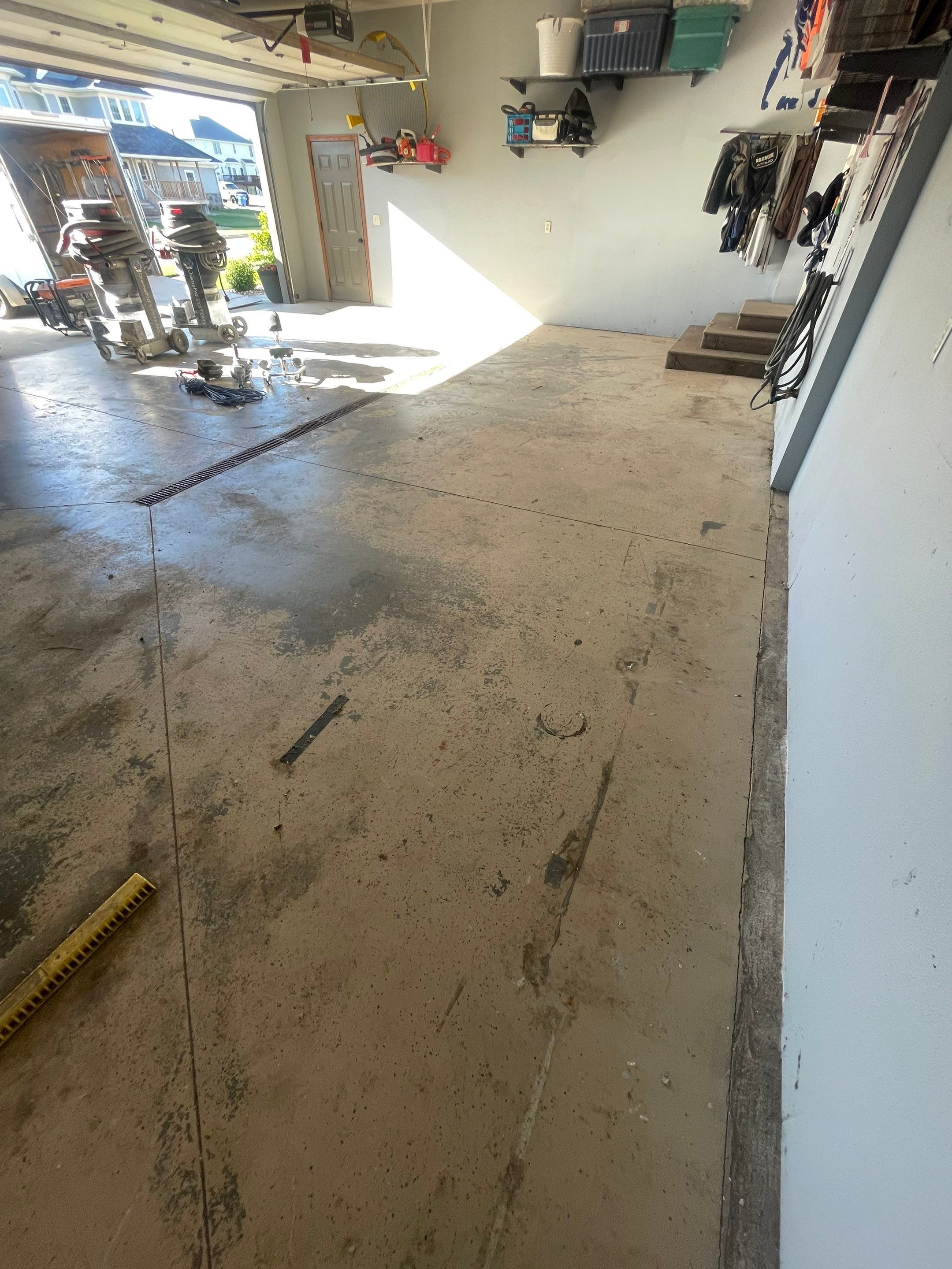 Full Garage Floor Epoxy Coating Installation in Dell Rapids by Select Painting, Coatings & Garage Cabinets