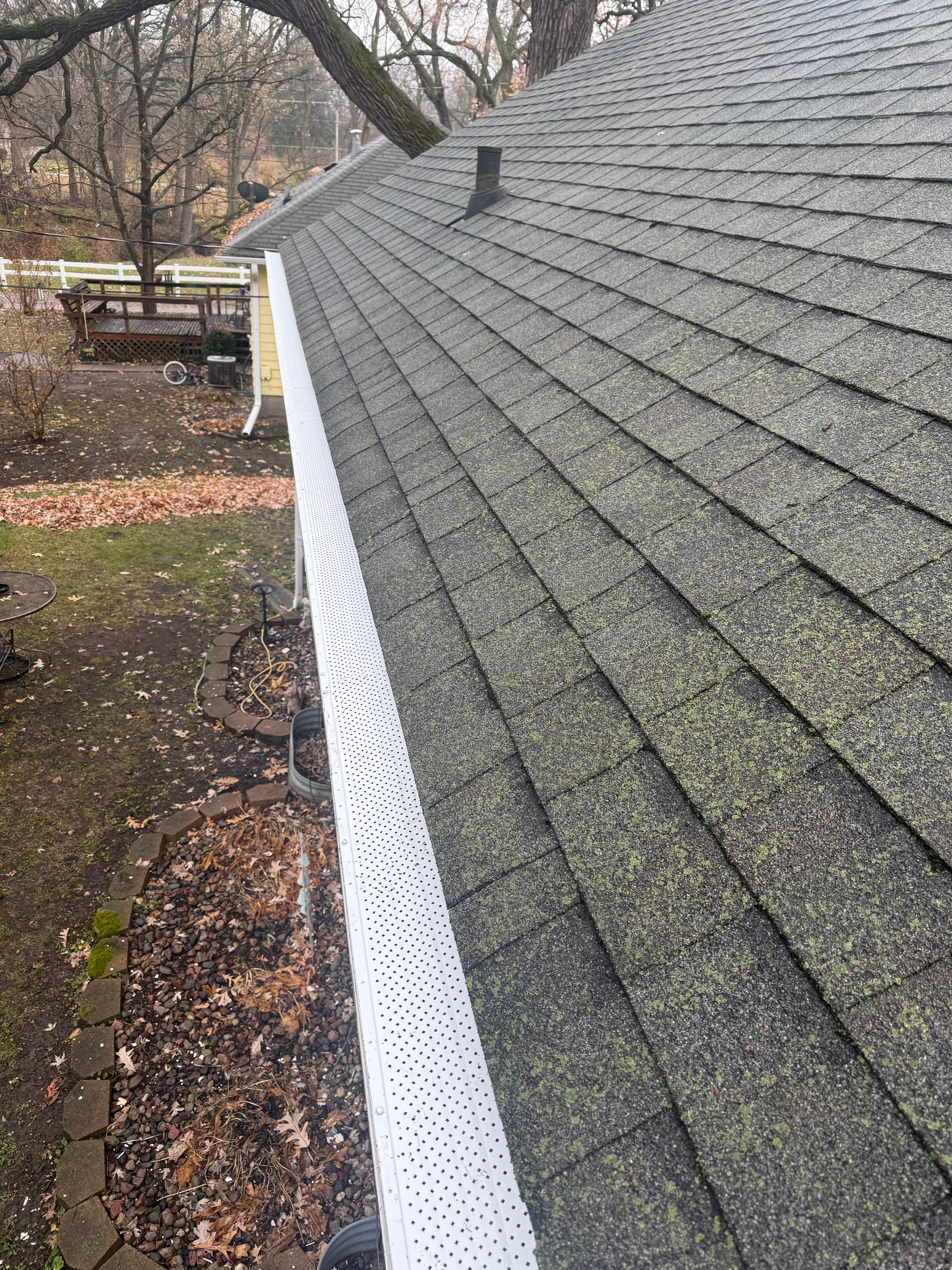 Garage Roof Replacement and Gutter Guard Installation in Red Oak by Star Home