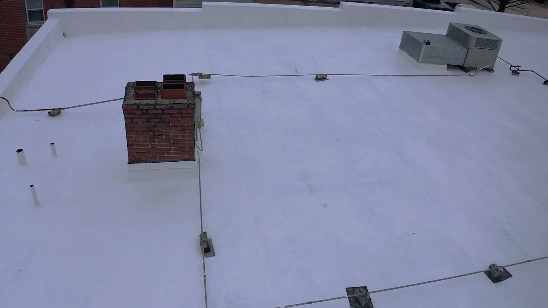 Commercial Roof Restored by Just In Time Roofing and Restoration