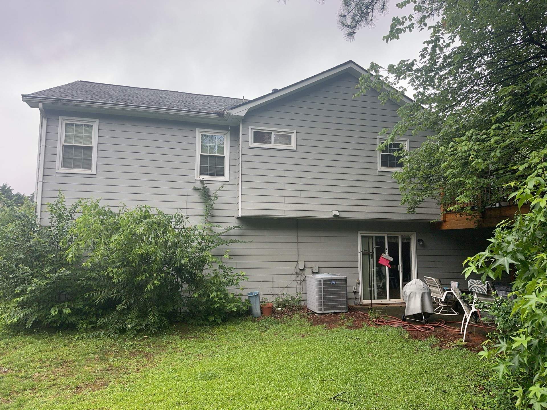 Alpharetta, GA Partial Siding Replacement, Porch Stain, and Exterior Painting by Nelson Exteriors 