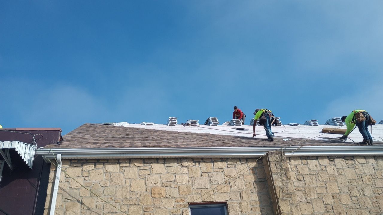 Commercial Roofing Installation using Performance Shingles by Mr. Roofer