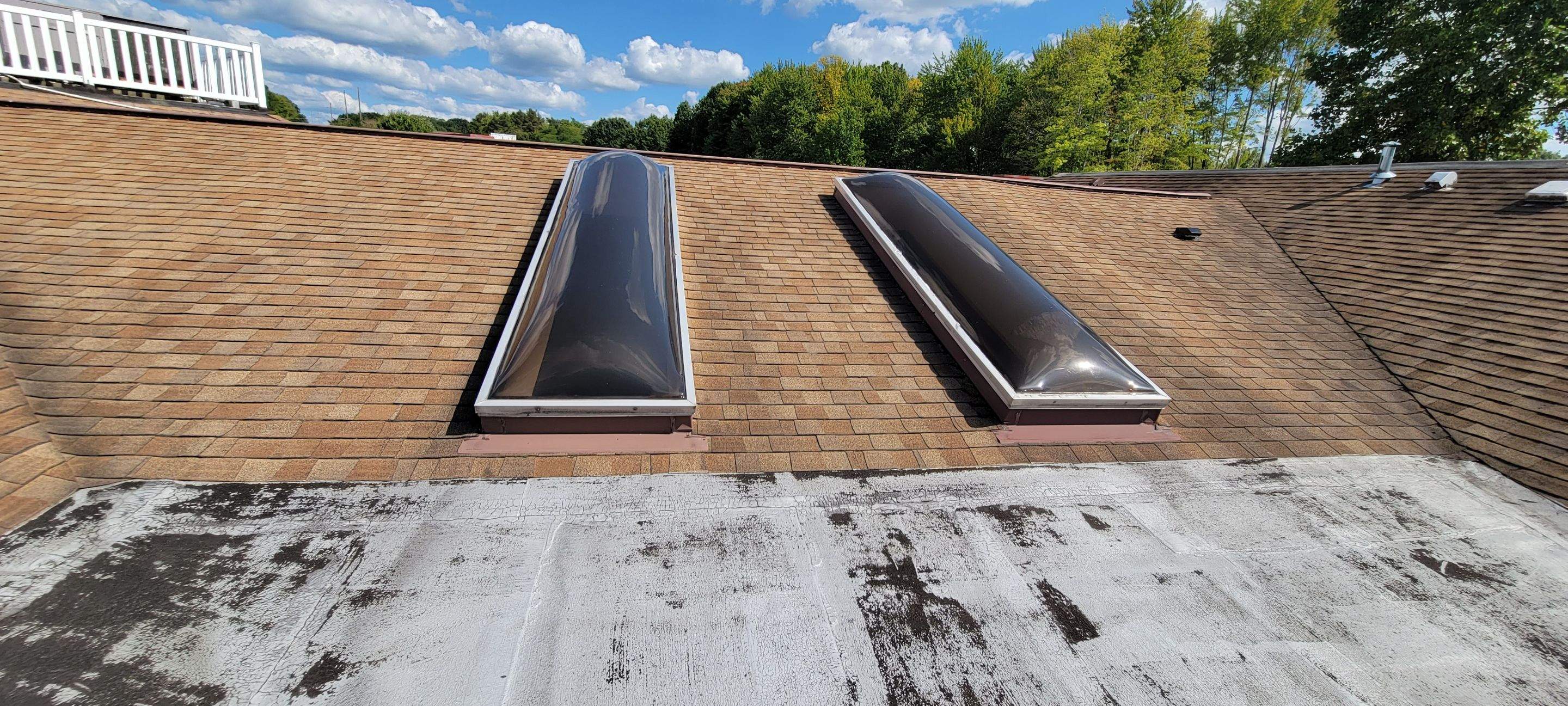 Skylight removal and install  by Absolute Roofing and Construction