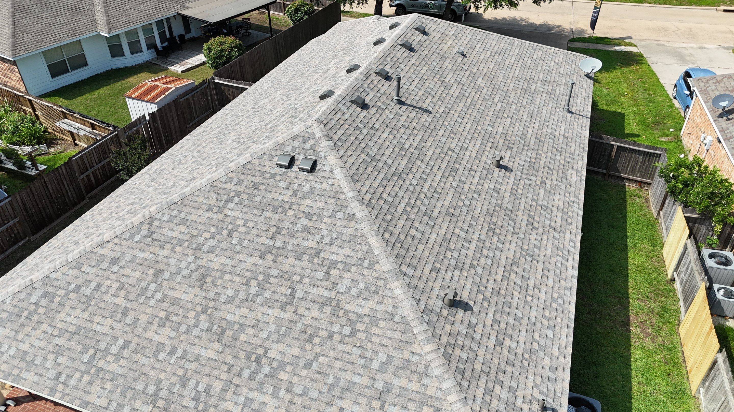 Residential Roofing & Gutter Installation using IKO Dynasty by Core Four Roofing