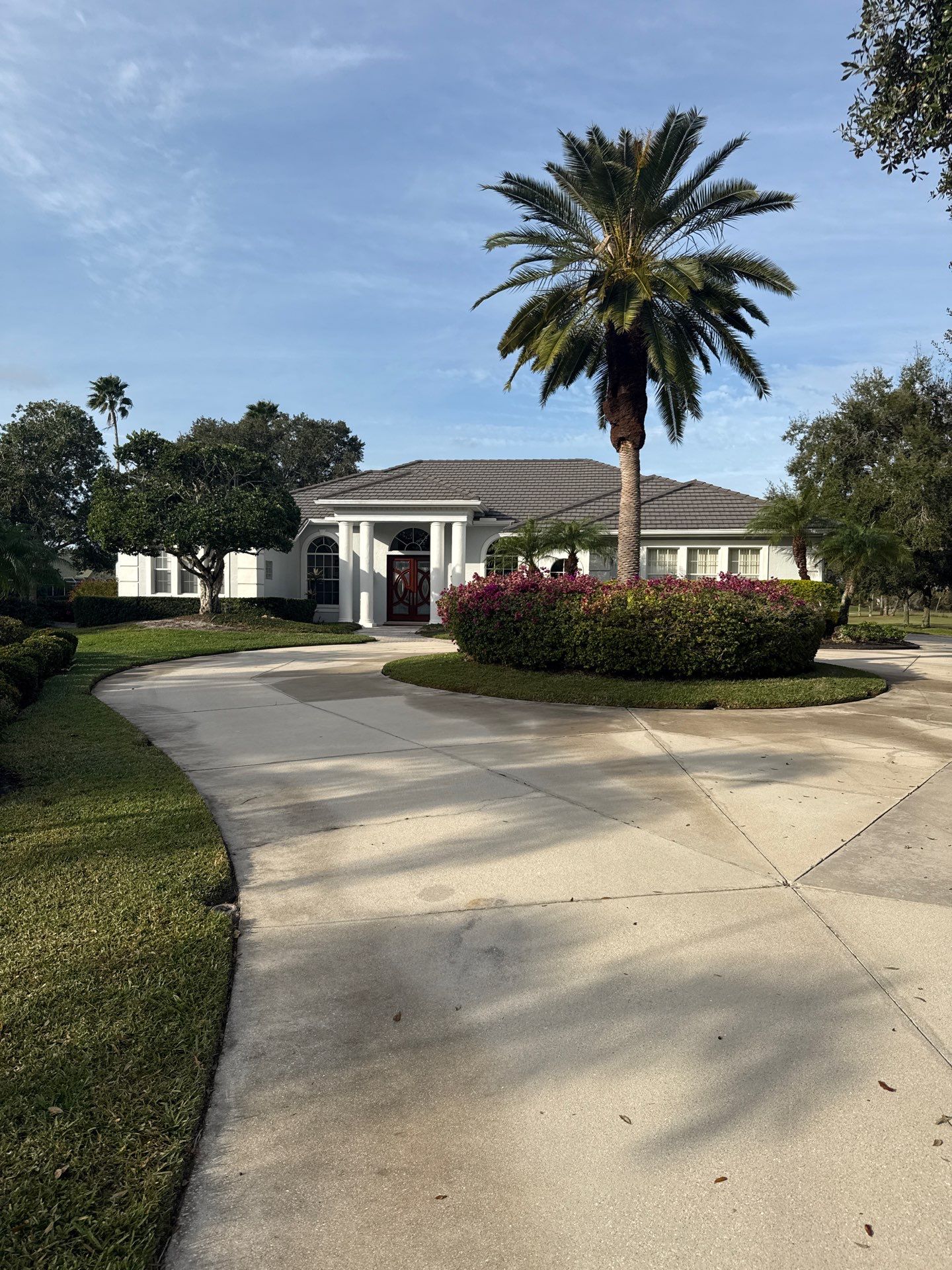 White Down Spouts using downspouts and White Seamless Gutters in Sarasota FL by Gutter Professors