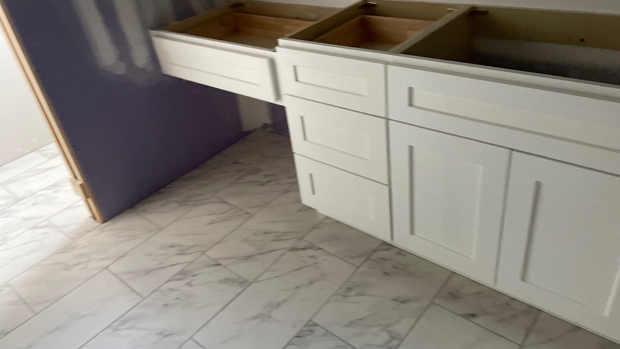 Remodeled Home with new tile floors, Showers and Refinished Oak Floors with stain and Waterbased Finish by Footprints Floors of Coastal Carolina