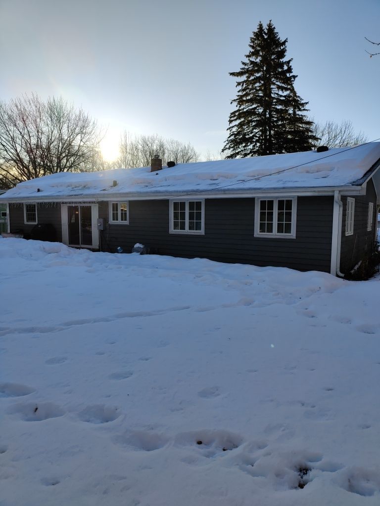 Steaming and Installing New Covers and Heating Cable by Next Level Seamless Gutters / Exteriors Inc.