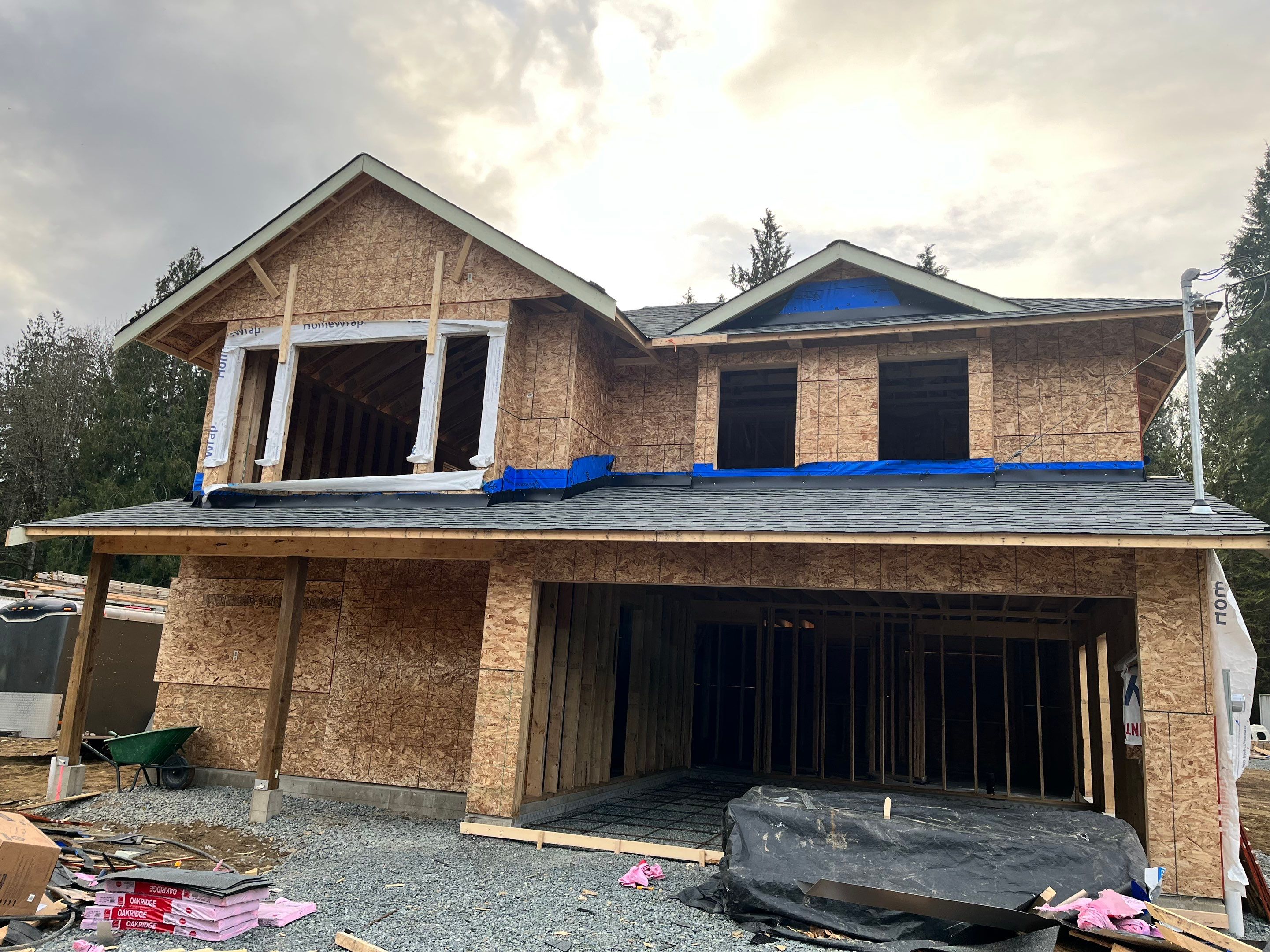 Residential Roofing Installation using OC Oakridge shingles by Top Notch Roofing Inc