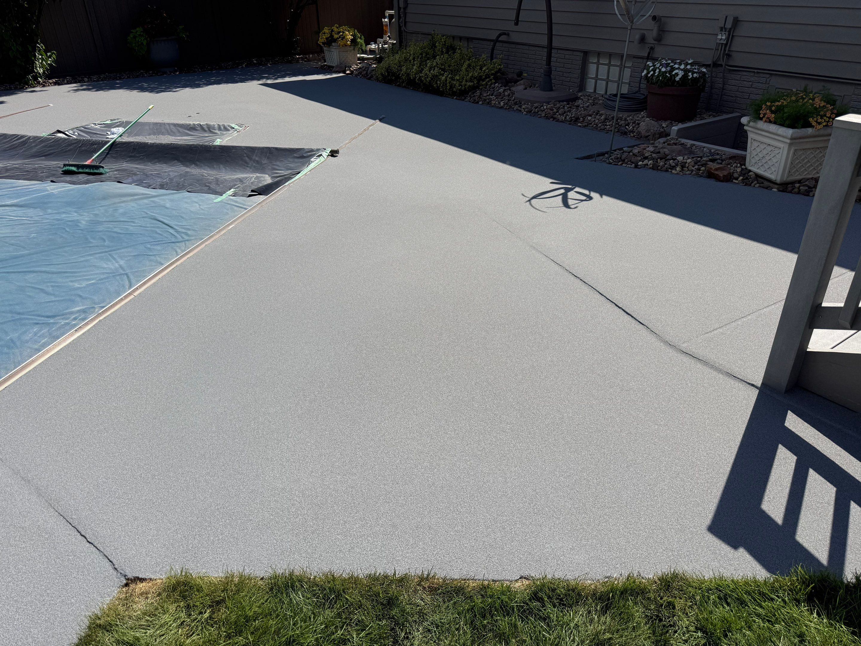 Residential Pool Deck Resurfacing in Sioux Falls by Select Painting, Coatings & Garage Cabinets