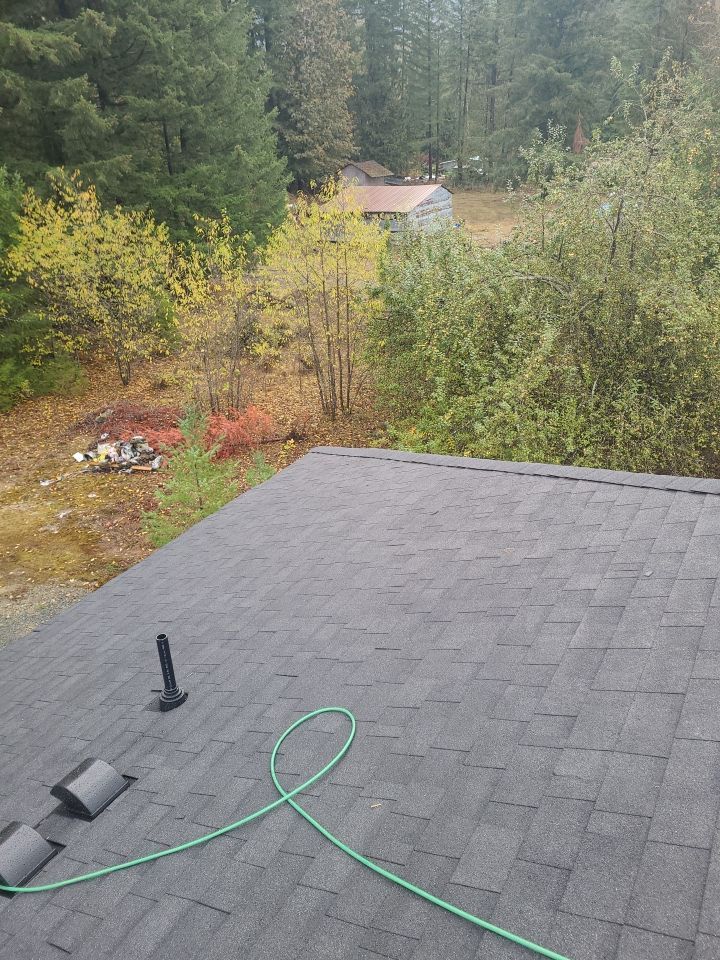 Residential Roofing Installation using OC Oakridge shingles by Top Notch Roofing Inc