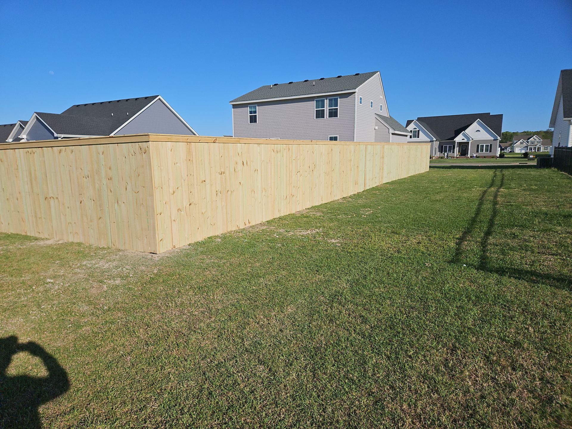 Stronger. Sleeker. Wood. by Tidewater Fence