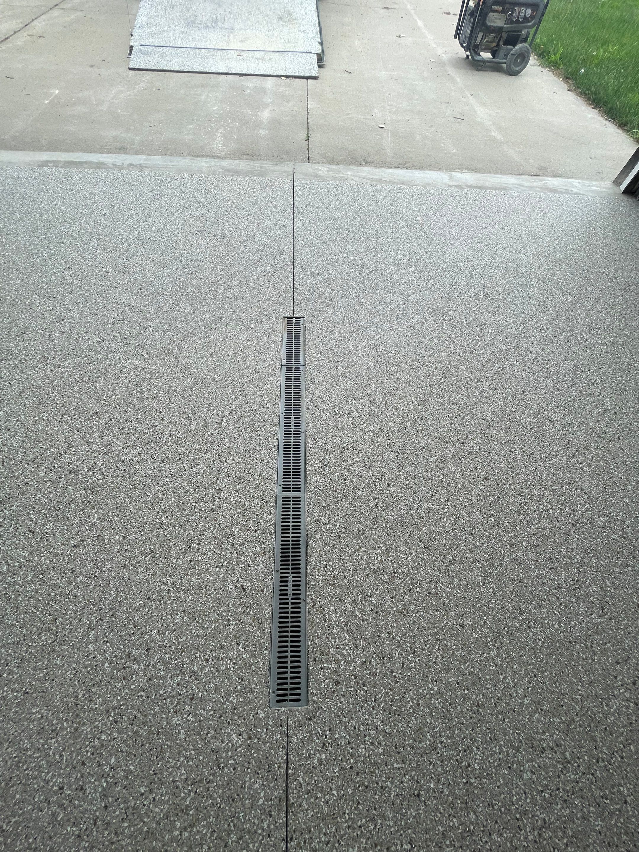 Hartford Residential Garage Floor Transformation With Decorative Chip Coating by Select Painting, Coatings & Garage Cabinets