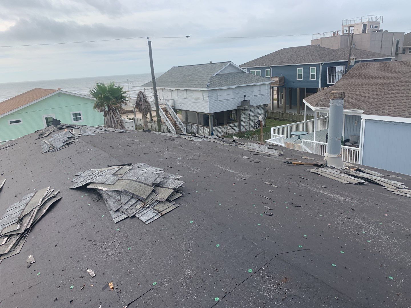 Galveston Waterfront Roof Installation In Progress by Elite Roofing LLC