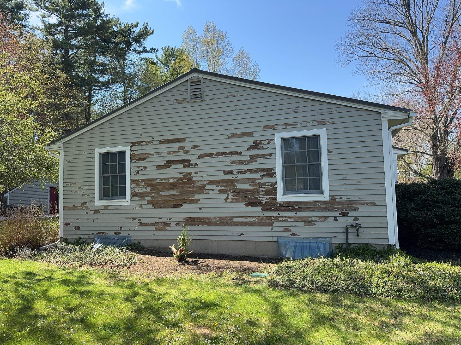 Vinyl Siding Replacement and Extensive Rot Repair on a Ranch Home in North Hampton, NH in North Hampton, NH